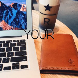 An instagram photo of a Starbucks Reserve Nitro Gascara Cloud cold brew coffee, a macbook air screen, and a brown leather passport wallet at the Starbucks Reserve Bar in Wai Ki Ki Beach in Oahu, Hawaii. This is the last part of a collage of images that together say Your Online Presence Can Make Or Break Your Business by Felice Marketing.